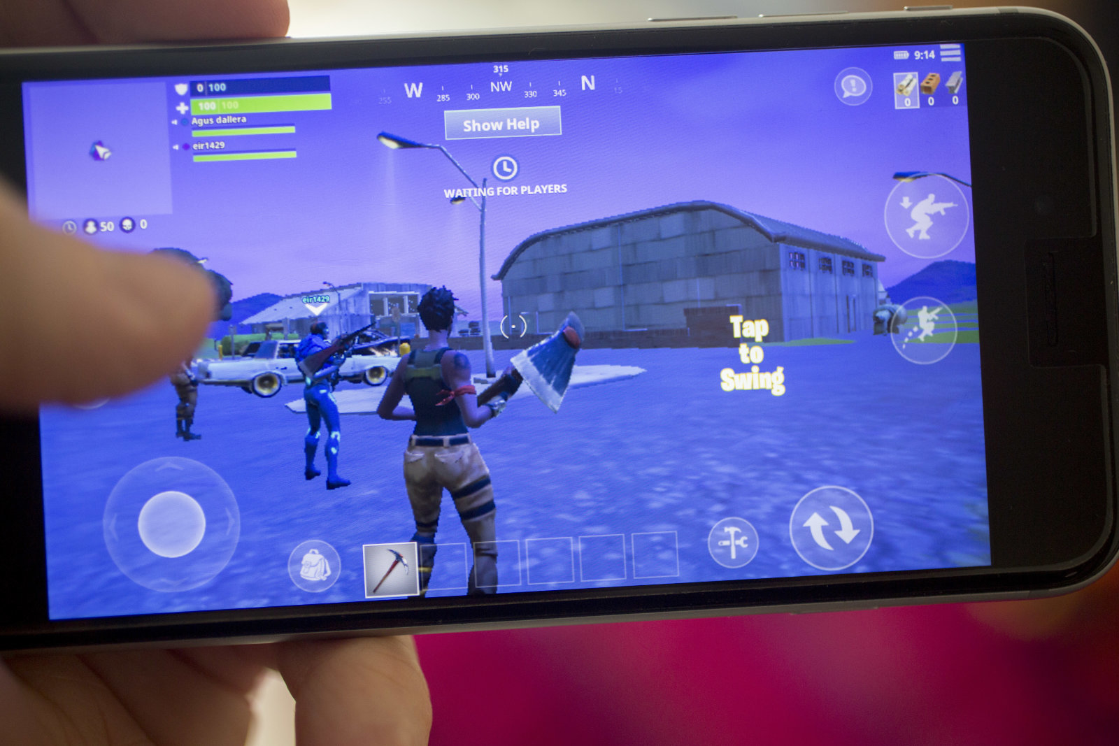 The Epic Games Inc. Fortnite: Battle Royale video game is displayed for a photograph on an Apple Inc. iPhone in Washington, D.C., U.S., on Thursday, May 10, 2018. Fortnite, the hitÂ gameÂ that's denting the stock prices of video-gameÂ makers after signing up 45 million players, didn't really take off until it became free and a free-for-all. Photographer: Andrew Harrer/Bloomberg via Getty Images