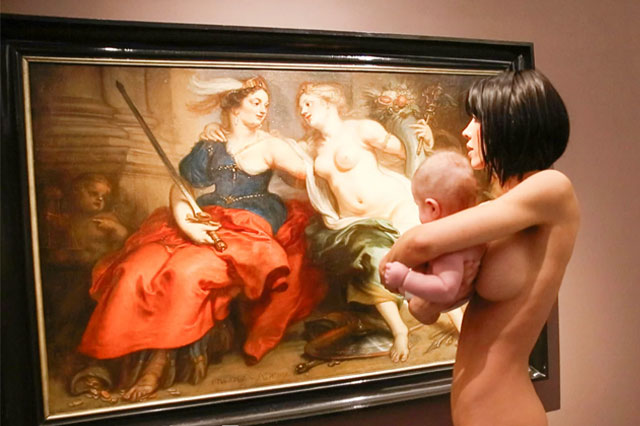 Naked woman strolls around museum with baby. Why?
