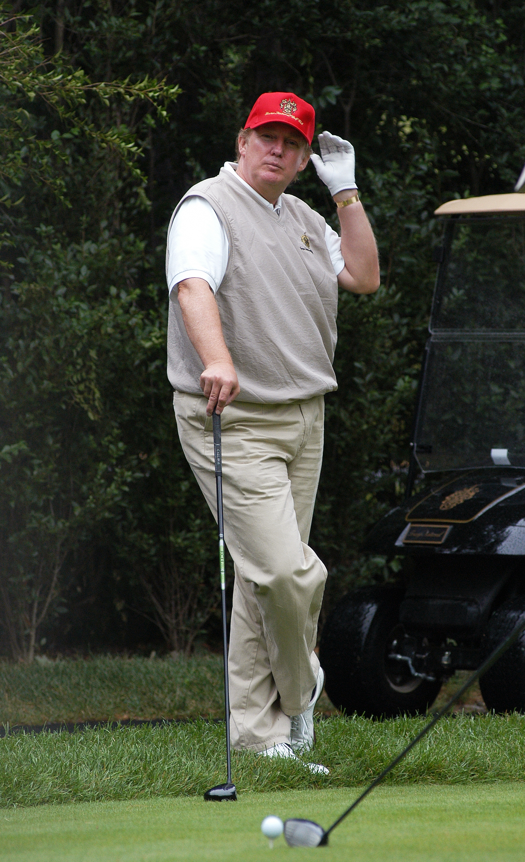 Real-estate mogul Donald Trump plays a round during an openi