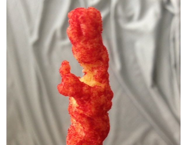 photo of iPhone-yielding, Pope-shaped Cheetos curl will forever change your view of the cheesy snack image