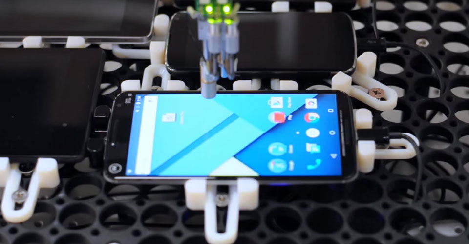 The TouchBot tests an Android phone