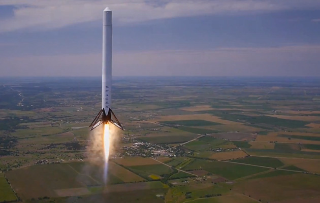 Watch SpaceX's reusable rocket hover at 3,280 feet before gently landing back to Earth