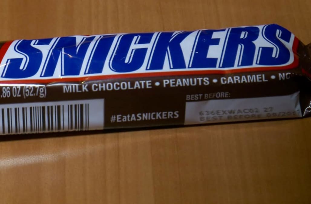 Mom finds thumbtack inside toddler's Snickers bar - AOL News