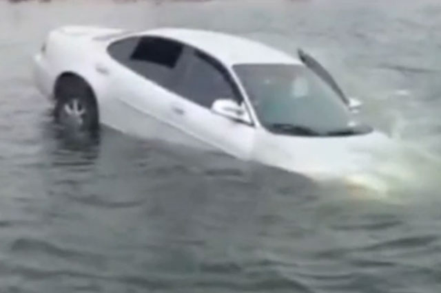 Dramatic Moment Teenager Saves Baby From Sinking Car (Video)