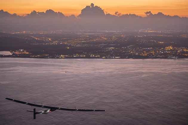 Hawaii, United States of America, June 28, 2015: Solar Impusle 2 lands in Hawaii  with Andrï¿½ Borschberg at the controls. The First Round-the-World Solar Flight will take 500 flight hours and cover 35ï¿½000 km, over five months. Swiss founders and pilots, Bertrand Piccard and Andrï¿½ Borschberg hope to demonstrate how pioneering spirit, innovation and clean technologies can change the world. The duo will take turns flying Solar Impulse 2, changing at each stop and will fly over the Arabian Sea, to India, to Myanmar, to China, across the Pacific Ocean, to the United States, over the Atlantic Ocean to Southern Europe or Northern Africa before finishing the journey by returning to the initial departure point. Landings will be made every few days to switch pilots and organize public events for governments, schools and universities.