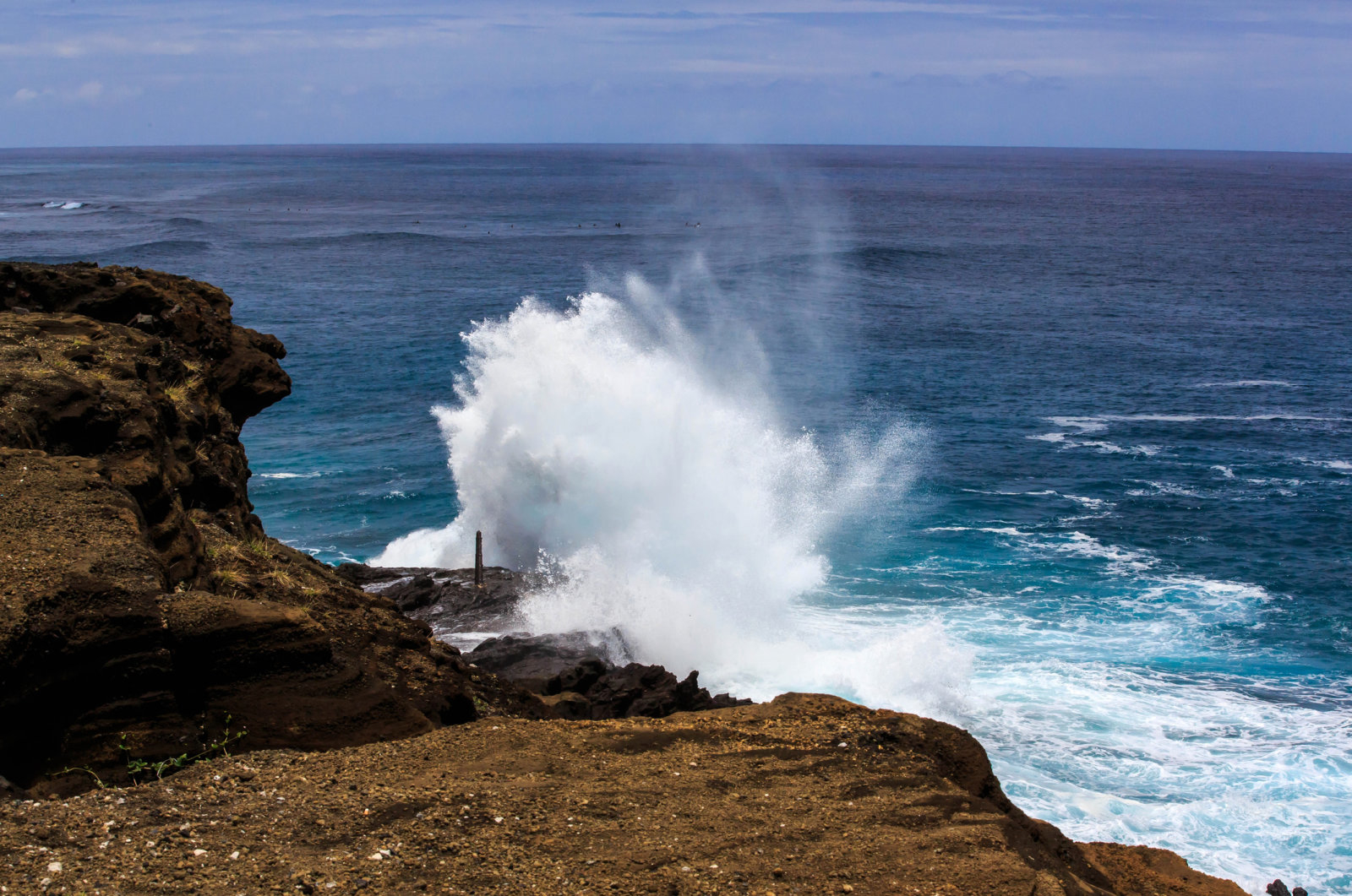 Teal Water and Waves Crashing at the Blow Hole Along Honolulu's Rugged Westside Coastline, Oahu, Hawaa