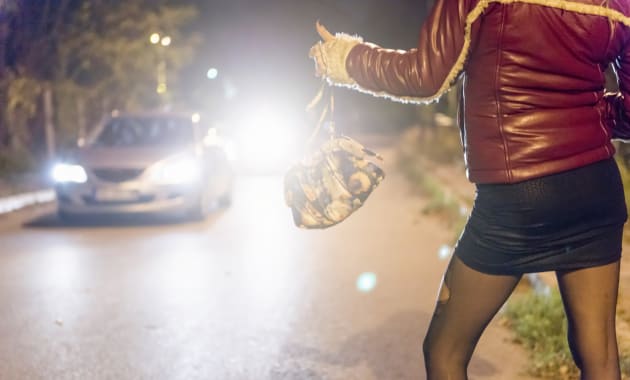 Prostitute on the street, stopping cars