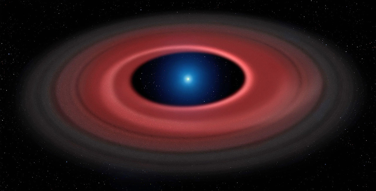 This artistâ€™s impression shows how an asteroid torn apart by the strong gravity of a white dwarf has formed a ring of dust particles and debris orbiting the Earth-sized burnt out stellar core Â SDSS J1228+1040. Gas produced by collisions within the disc is detected in observations obtained over twelve years with ESOâ€™s Very Large Telescope, and reveal a narrow glowing arc.