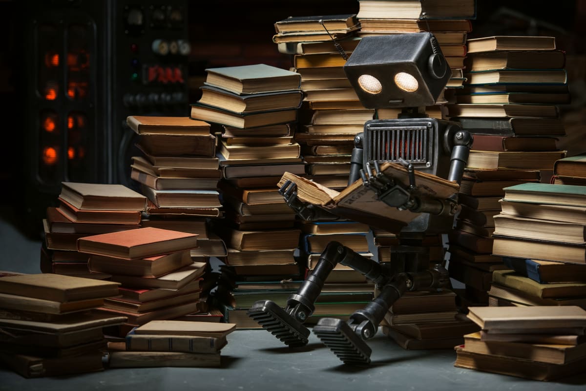 robot child reading a book in...