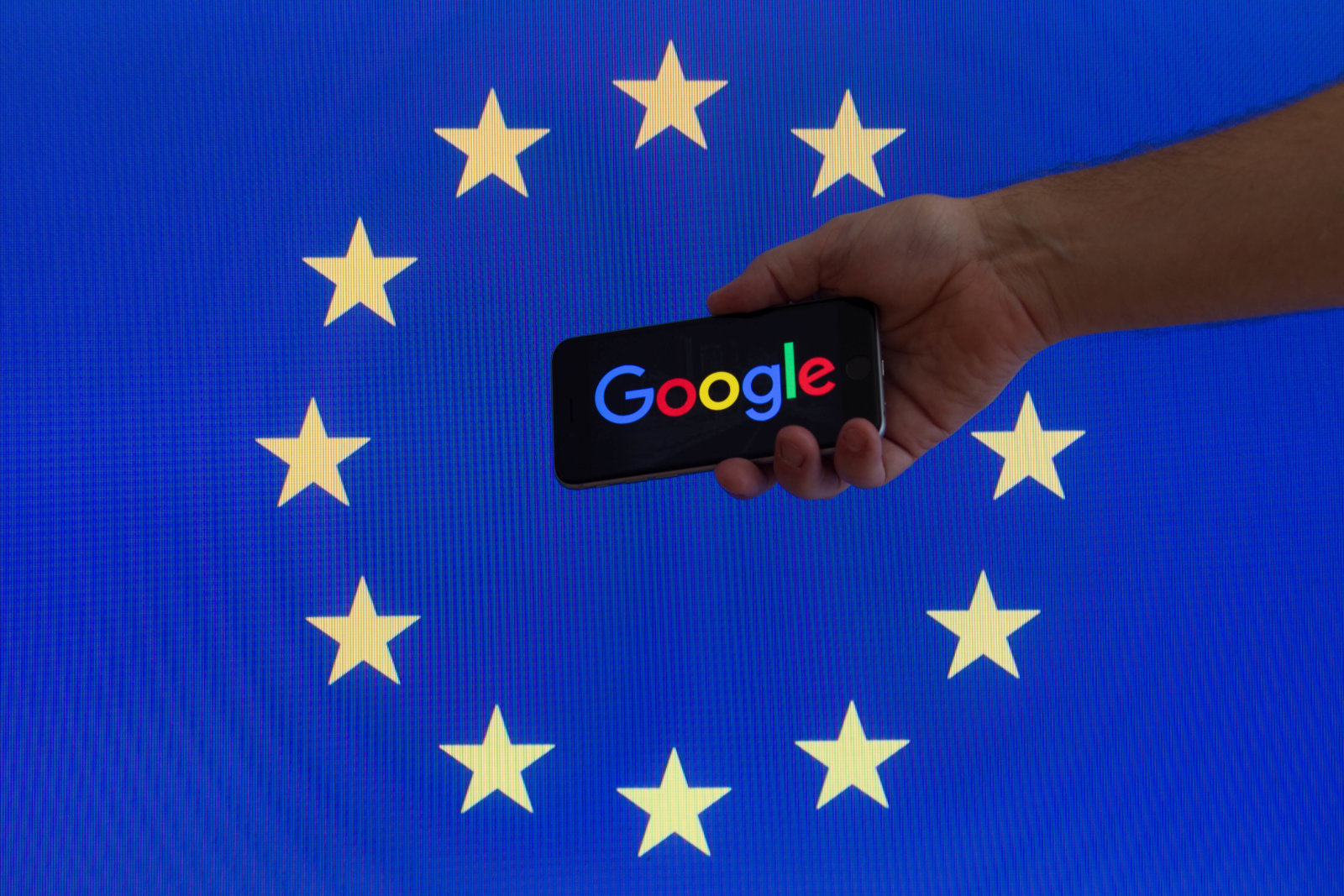 The EU flag is seen with Google logo. (Photo by Jaap Arriens/NurPhoto via Getty Images)