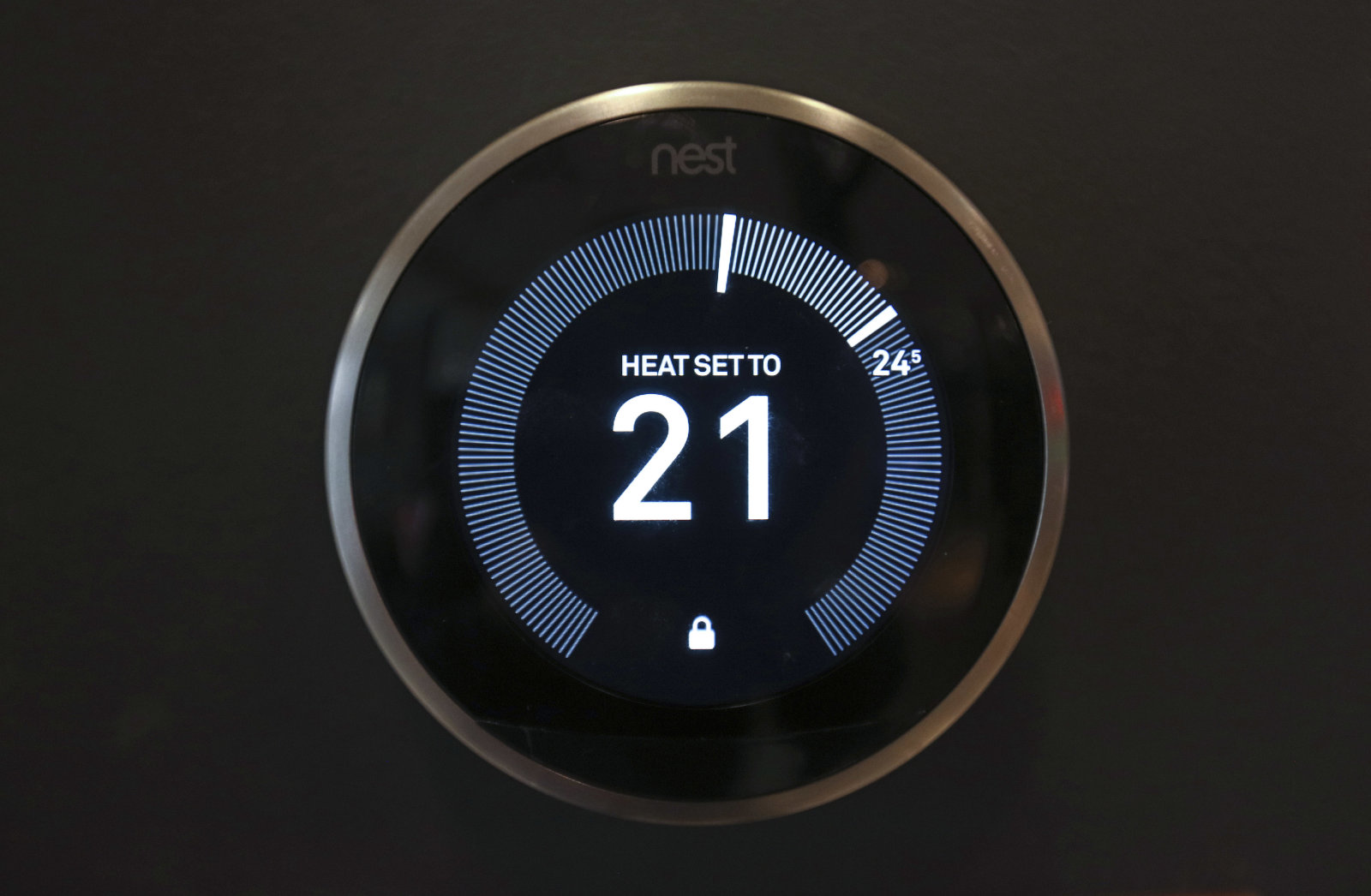 A Nest Labs Inc. digital wireless controlled thermostat sits on display in the Smart Home section of a John Lewis Plc department store in London, U.K., on Friday, April 8, 2016. The increasing integration of connected devices into our lives, what is commonly referred to as the Internet of things or IoT, promises enormous benefits for consumers and businesses. Photographer: Chris Ratcliffe/Bloomberg via Getty Images