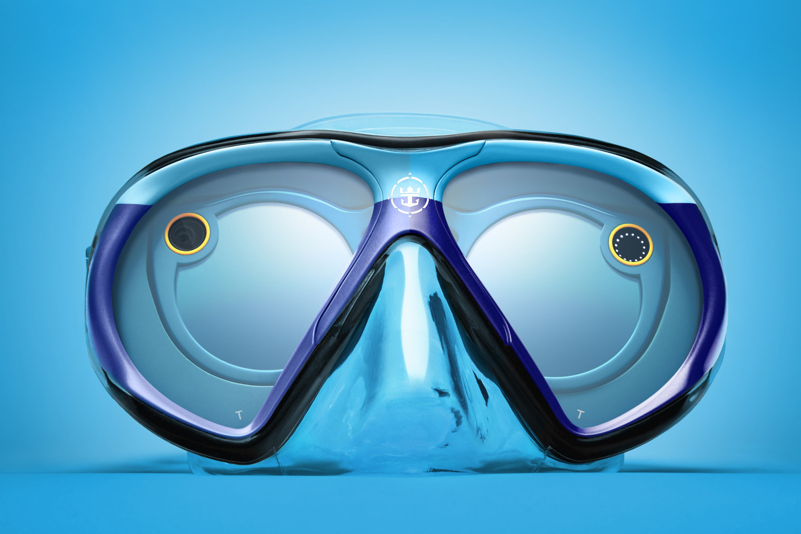 From June 21 to June 25, Royal Caribbeanï¿½s Snapchat channel will immerse viewers in a one of-a-kind underwater adventure thanks to a custom-designed scuba mask dubbed ï¿½SeaSeekers.ï¿½ The mask was custom engineered by the cruise line for use with Snapchat Spectacles. It allows the wearer to snap while underwater and will give those above the surface a unique perspective into the intriguing underwater world of marine life. Fans can #SeekDeeper by following @RoyalCaribbean on Snapchat. (PRNewsfoto/Royal Caribbean)