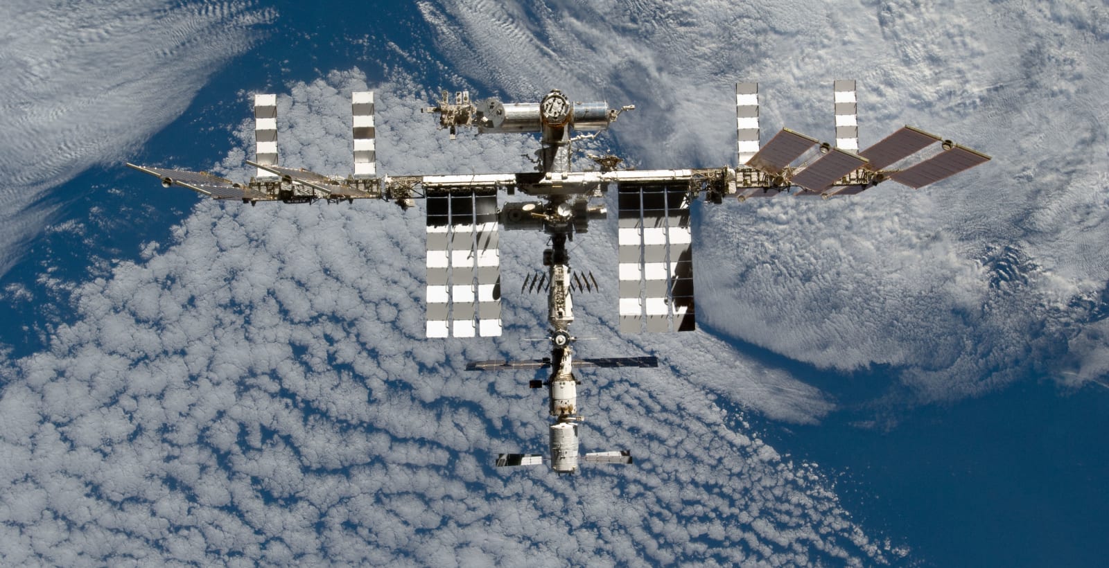Space Station Over Earth (NASA, International Space Station, 03/07/11)