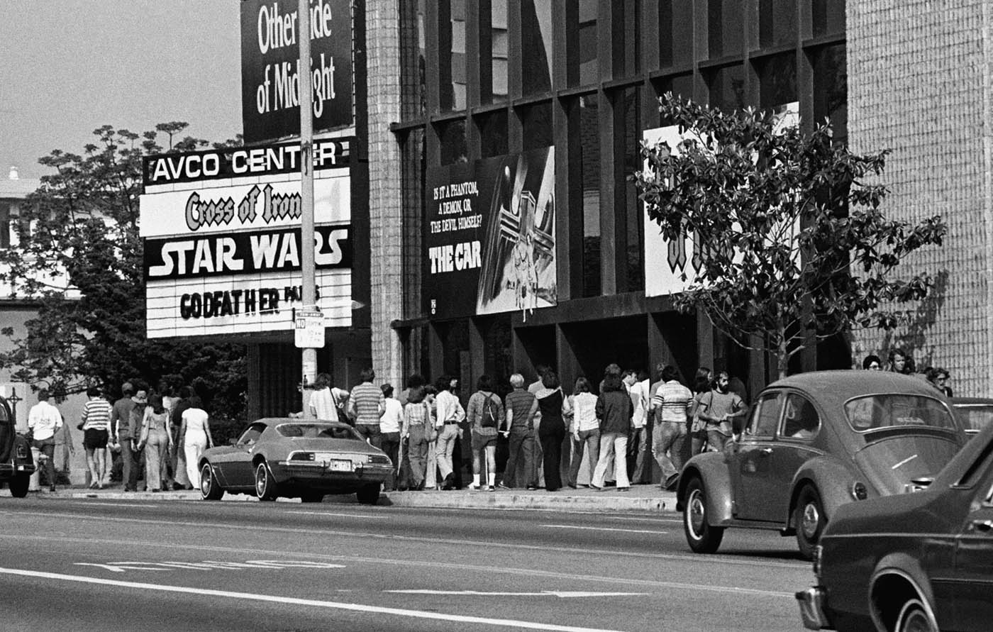 ** FILE ** In this June 7, 1977 file photo, theater goers wait in lines in front of the Avco Center Theater in Los Angeles to see "Star Wars." (AP Photo, file)