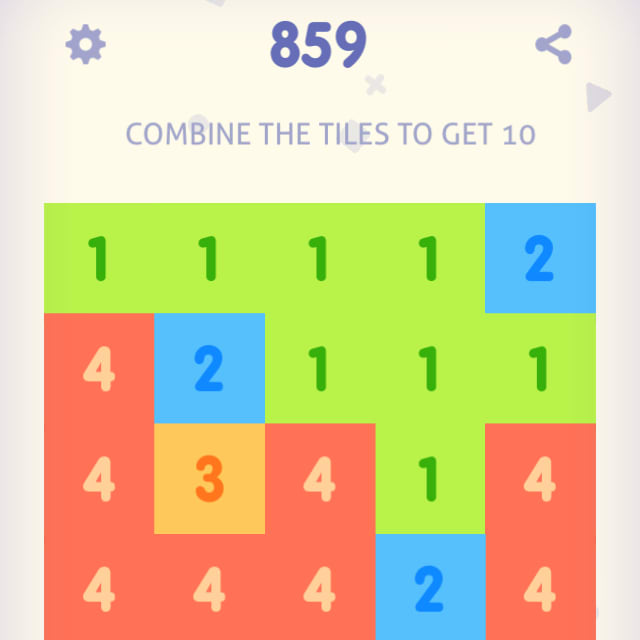 Players tap on adjacent blocks with the same number to combine them into a larger number block in Just Get 10