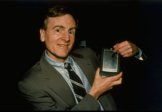 Apple Computer's John Sculley showing off Apple Newton handheld personal data asst. (PDA) computer. (no caps). (Photo by Marty Katz//Time Life Pictures/Getty Images)
