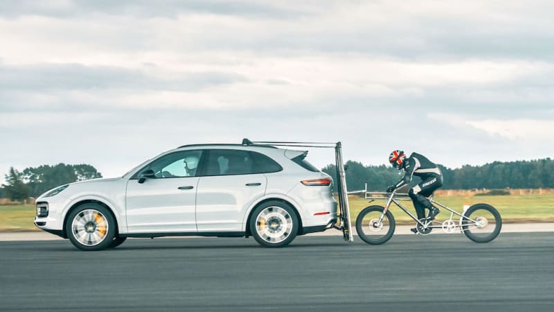 photo of New European bicycle speed record set behind Porsche Cayenne Turbo image