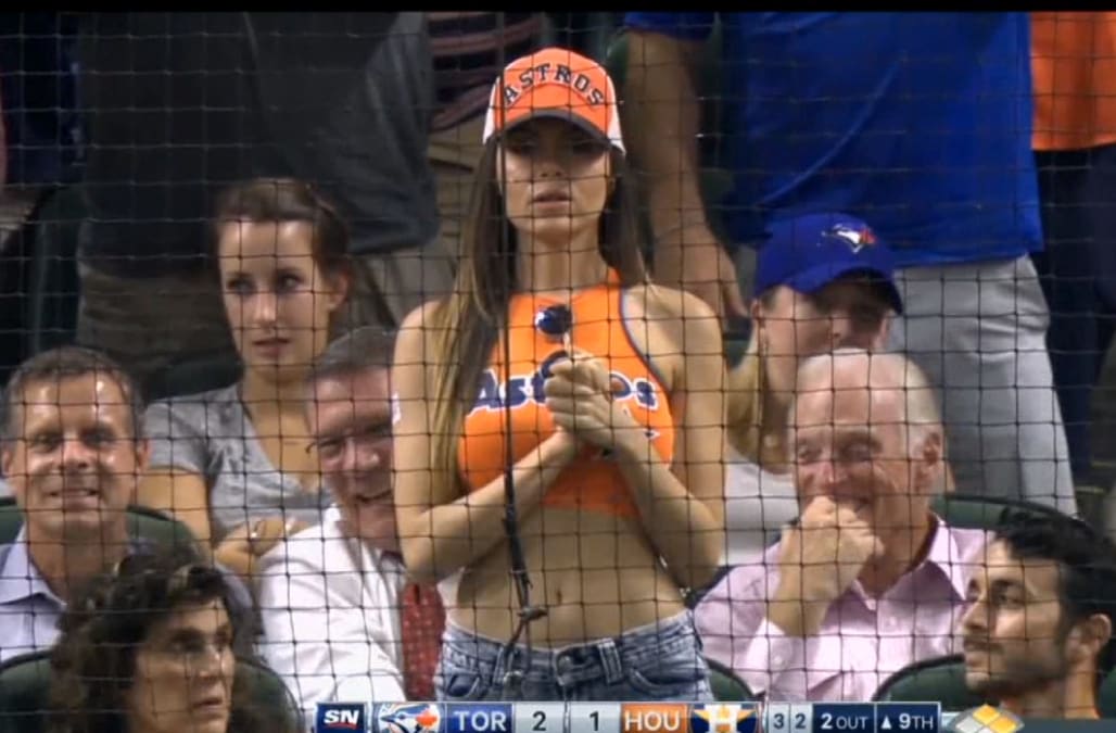 Model Terann Hilow seen praying at Houston Astros game