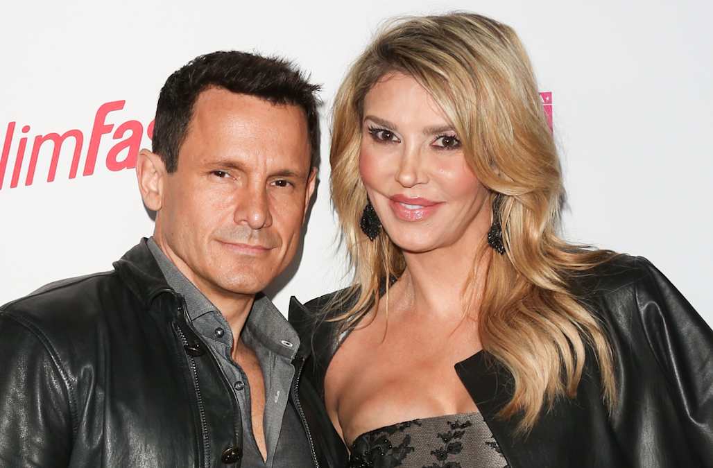 Brandi Glanville and new boyfriend DJ Friese pose entirely nude in bed