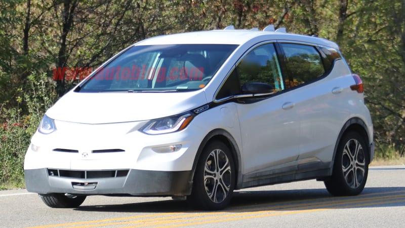 photo of Chevy Bolt EV autonomous prototype spied with driver on the phone image