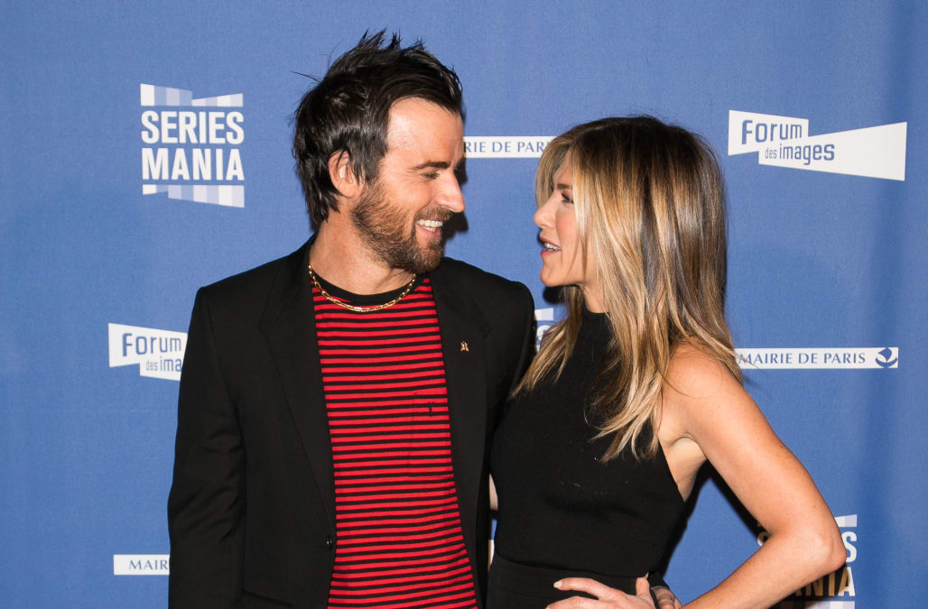 Jennifer Aniston and Justin Theroux in matching black at Louis Vuitton  event in Paris
