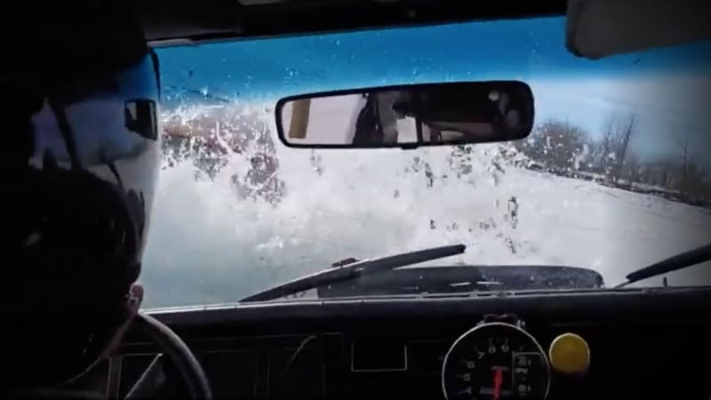 Watch two cars sink into the St. Lawrence River during the Ice Race