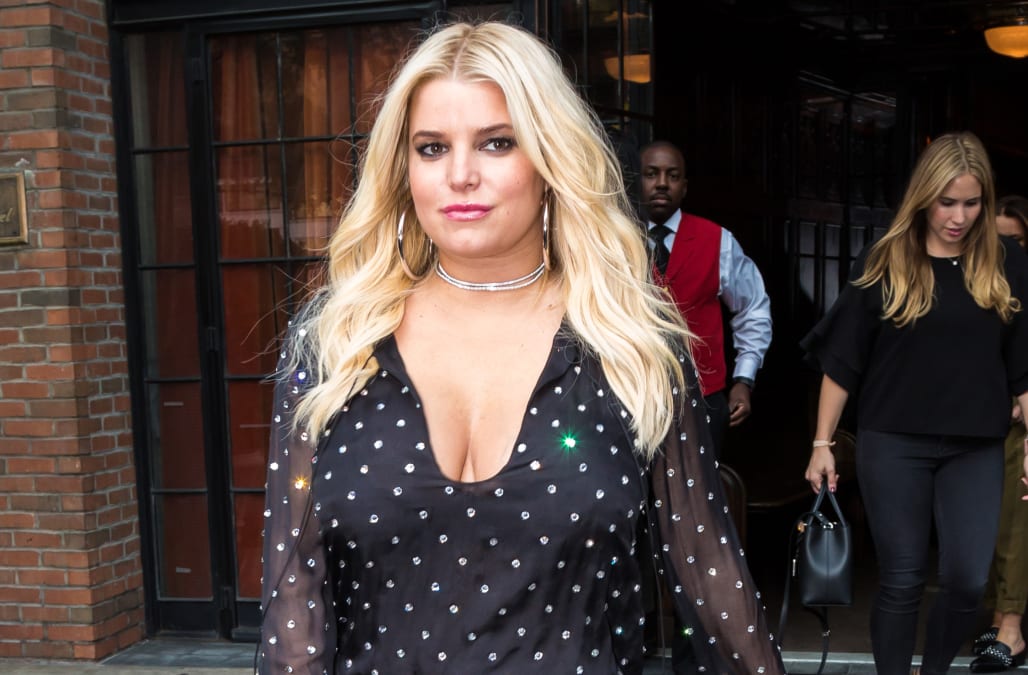 Jessica Simpson's husband sweetly saves her as she takes a tumble after ...
