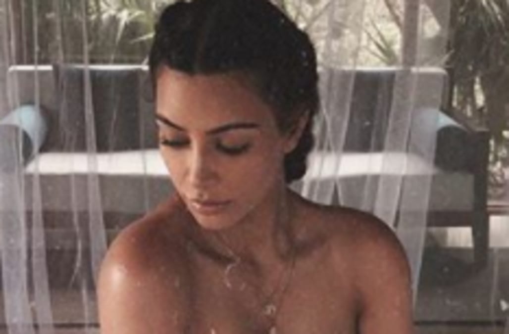 Topless Blonde Beach Nude - Kim Kardashian shares topless photo taken by husband Kanye ...