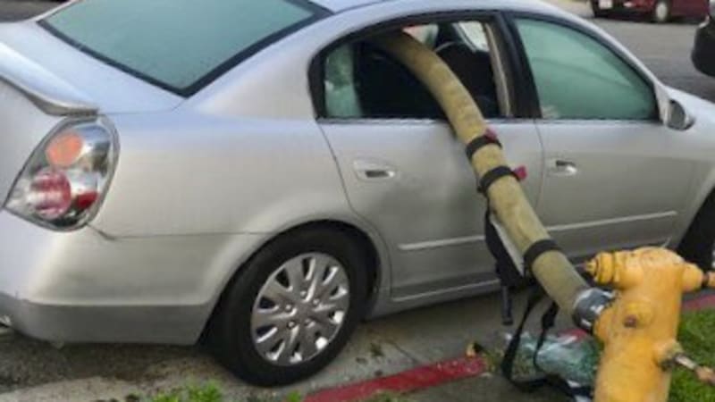 Image result for fire hose through car windows