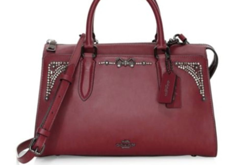 saks handbag sale