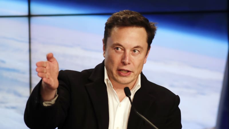 photo of Elon Musk says Tesla driverless taxis coming next year, touts self-driving chip image
