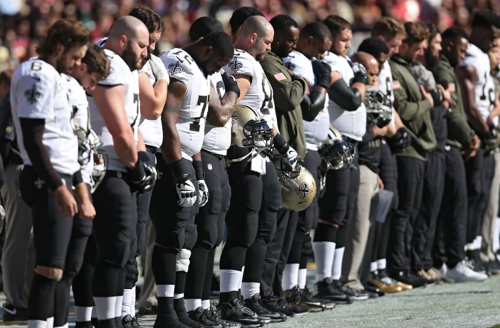 After Trump Blasts Nfl Players Kneel And Lock Arms In