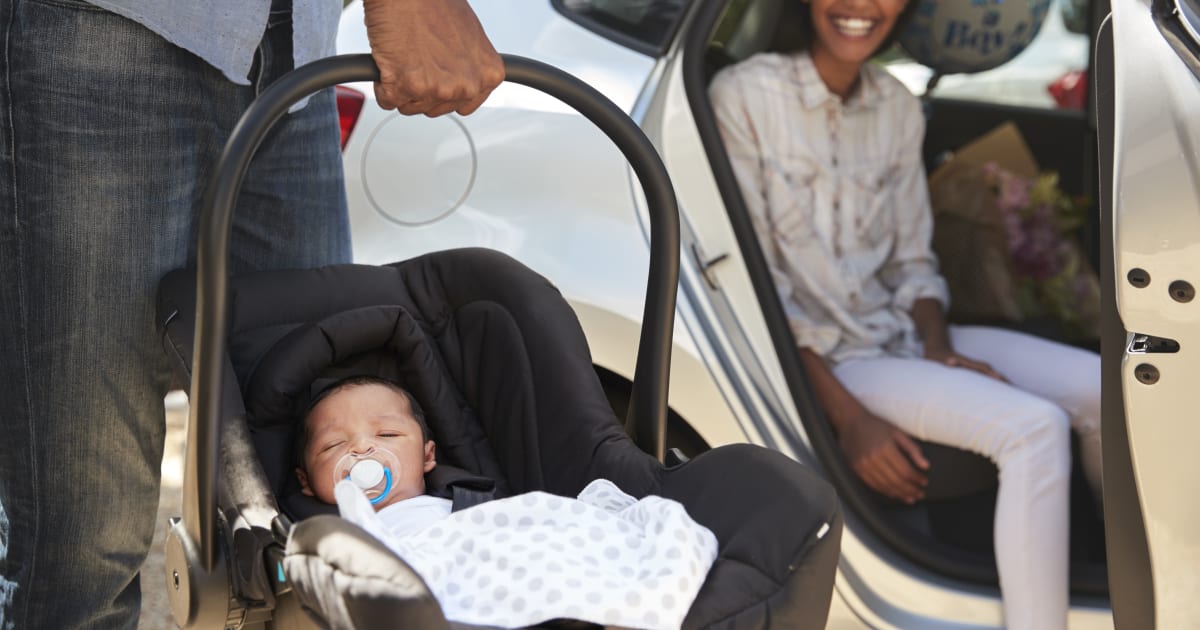 Chiropractor Shows Parents How To Properly Carry A Baby Car Seat