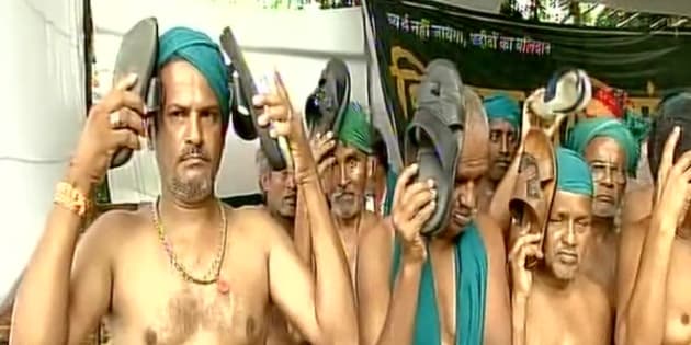 Image result for Tamilnadu farmers beat themselves with flip-flops to protest the salary hikes of state legislators