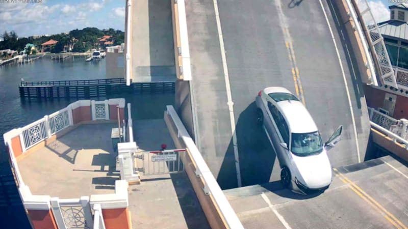 Florida driver gets upended by rising drawbridge in video