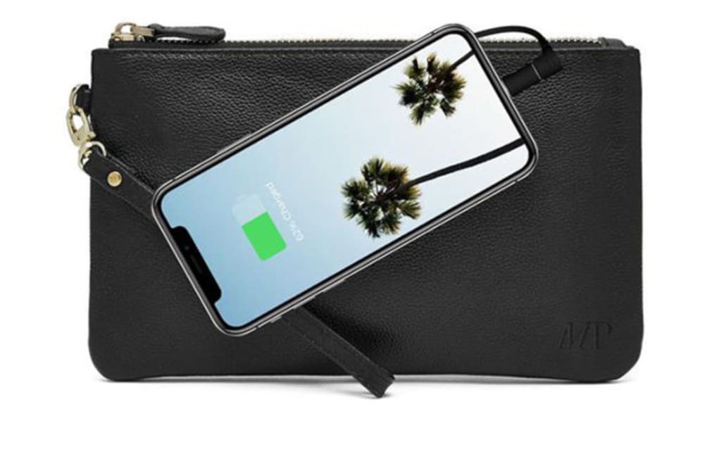 This chic leather wallet features a secret iPhone charger