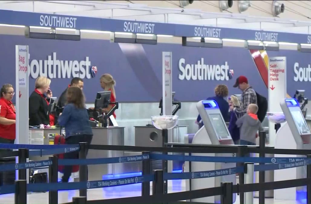 Southwest pilot arrested after handgun found in carry-on - AOL News