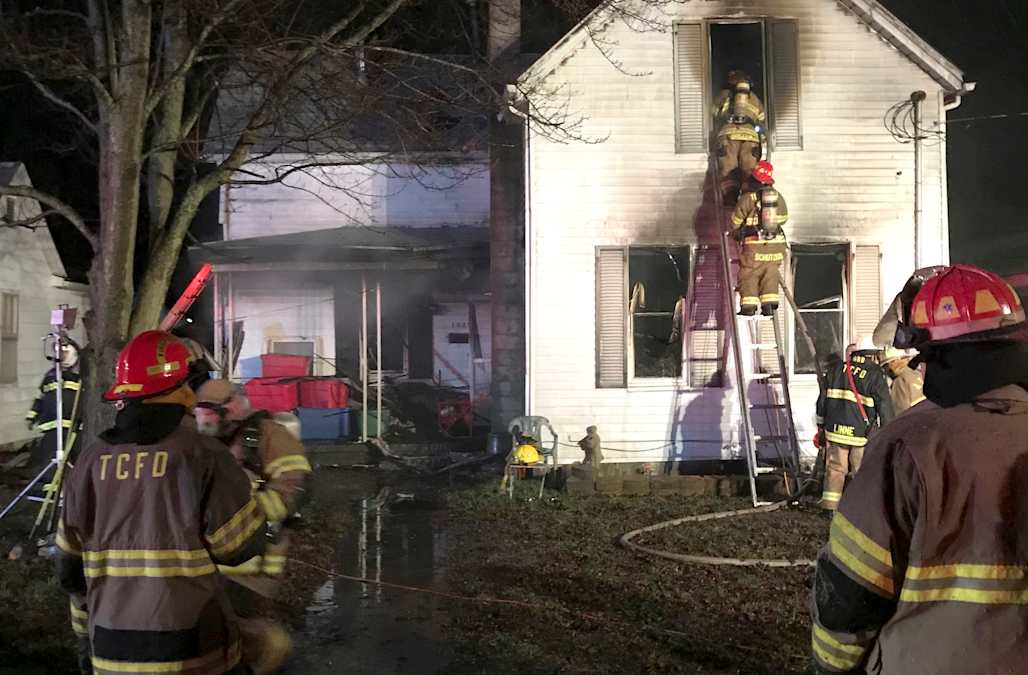 House fire kills 3 young siblings in southern Indiana city