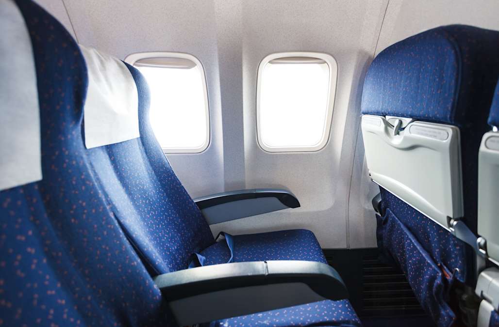 Here’s why airplane seats are actually facing the wrong way