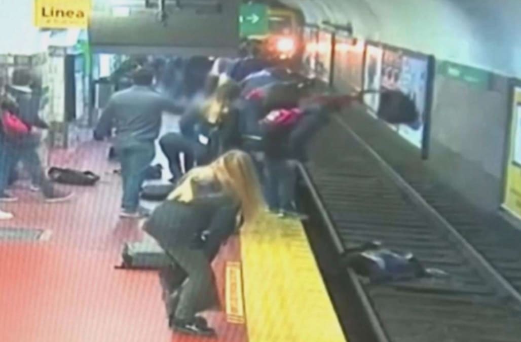 Bystanders Rush To Rescue Woman Who Fell Onto Subway Tracks