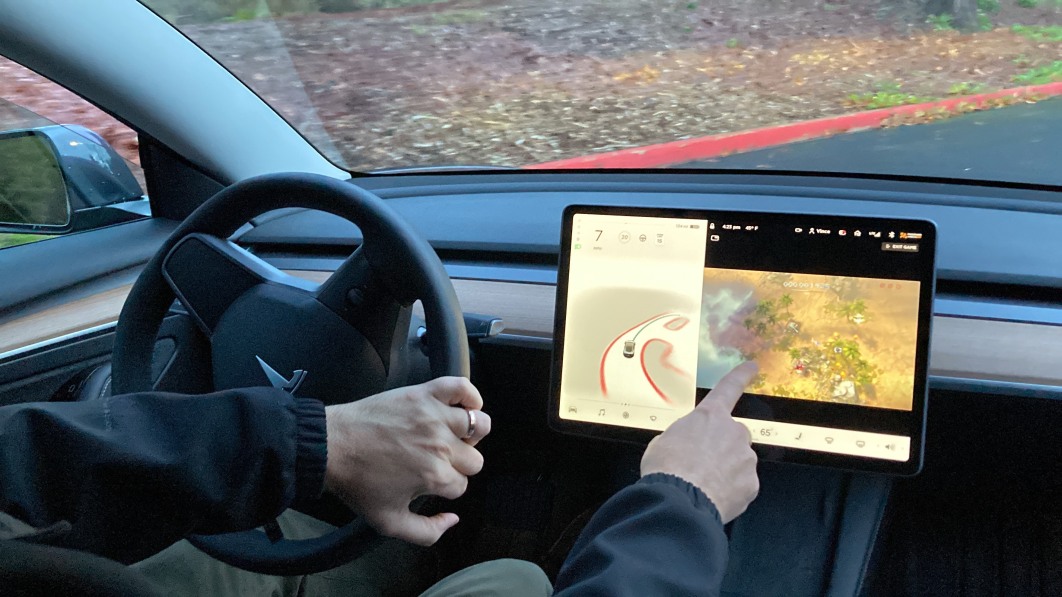 Tesla disables ‘Passenger Play’ video games in moving cars