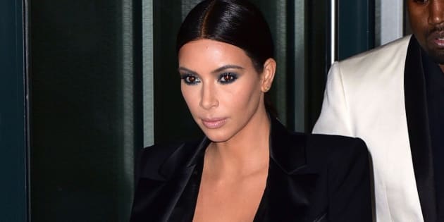 Kim Kardashian Braves The Cold In Sexy Cleavage-Bearing Dress ...