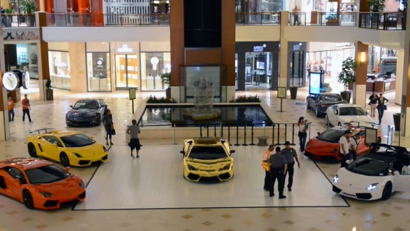 Watch a parade of five Lamborghinis make their way through a shopping mall