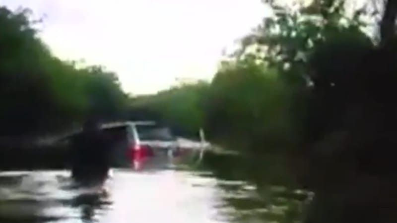 Police Body Cam Captures Rescue Of Motorists Caught In Flood Autoblog