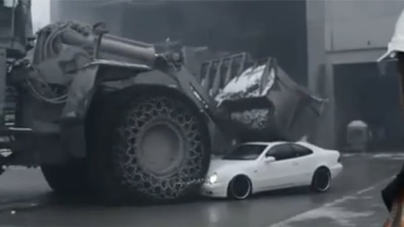 Watch this perfectly nice Mercedes get crushed by a front-end loader