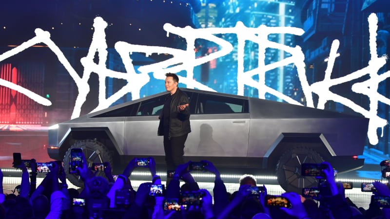 Tesla co-founder and CEO Elon Musk unveils the all-electric battery-powered Tesla