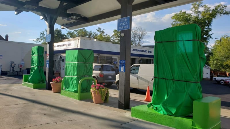 photo of 61-year old service station replaces gas pumps with EV chargers image