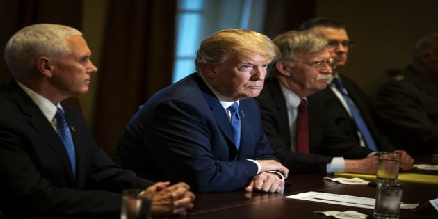U.S. President Donald Trump, center, listens during a meeting with senior military leadership in the Cabinet Room of the White House in Washington, D.C., U.S., on Monday, April 9, 2018. Trump said he'll decide within two days on U.S. retaliation against Syria for a suspected chemical weapons attack by President Bashar al-Assad's regime over the weekend, and suggested Russian President Vladimir Putin may share responsibility. Photographer: Al Drago/Bloomberg via Getty Images
