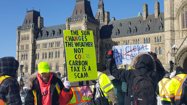 A protestor still registers at the "United We Roll" rally on Parliament Hill in Ottawa on February.