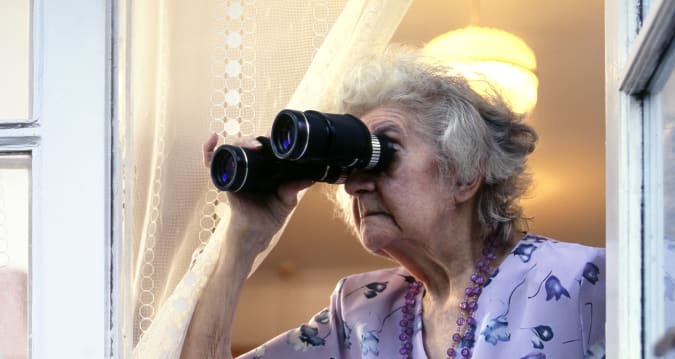 Retired lady snooping on neighbours